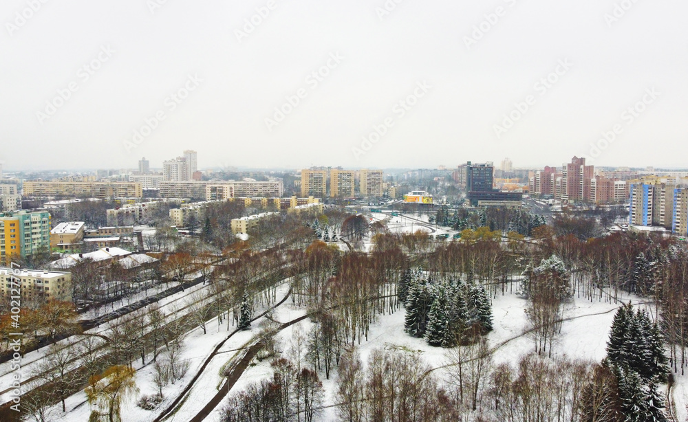 Top view of snowy city park in winter