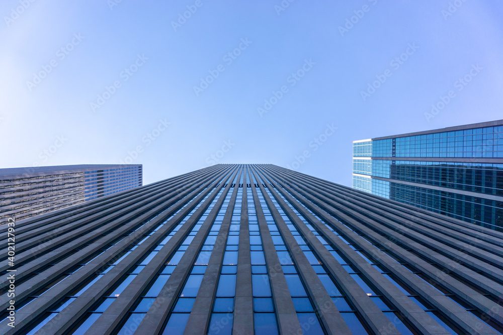 Look up at buildings on the streets of New York