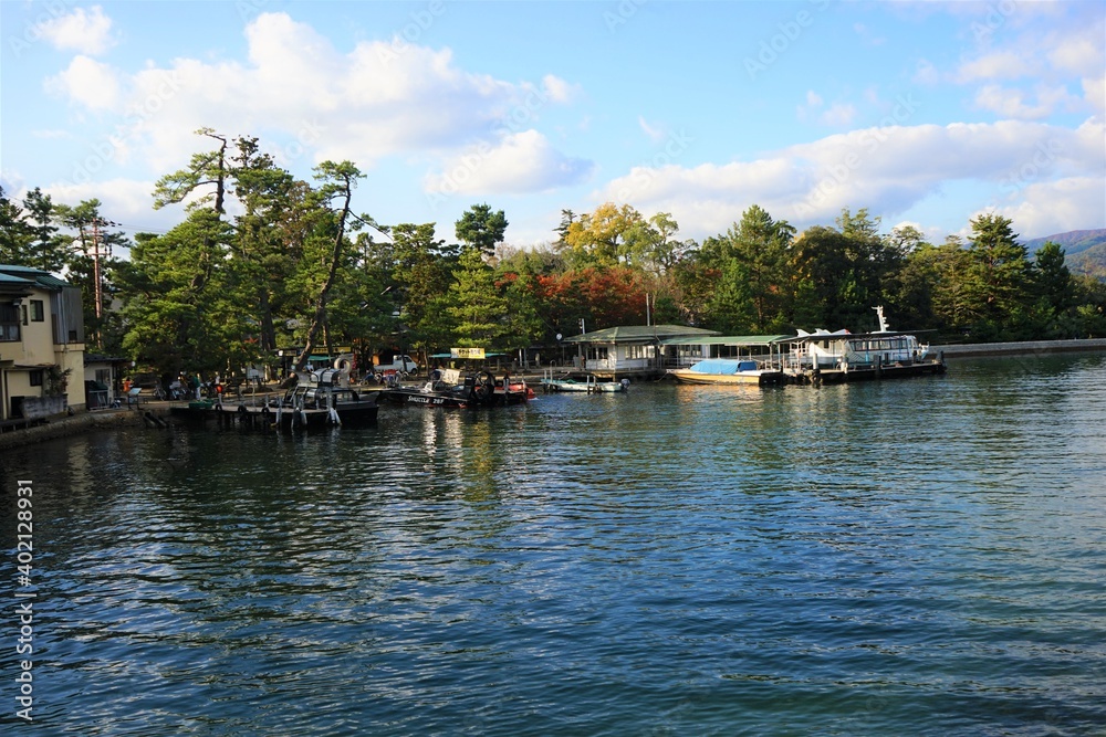 View of Amanohashidate Shore with pint tree and colorful foliage, Kyoto, Kansai Region, Japan - 天橋立海水浴場 松の木 日本三景 京都 View of Amanohashidate Shore with pint tree and colorful foliage, Kyoto, Kansai Region, Japan - 天橋立海水浴場 松の木 日本三景 京都