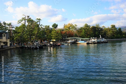 View of Amanohashidate Shore with pint tree and colorful foliage, Kyoto, Kansai Region, Japan - 天橋立海水浴場 松の木 日本三景 京都 