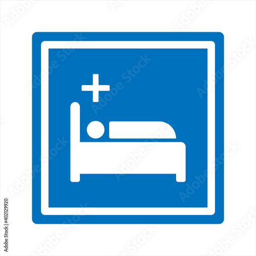 Hospital icon, black isolated icon with medical cross and person in bed symbols