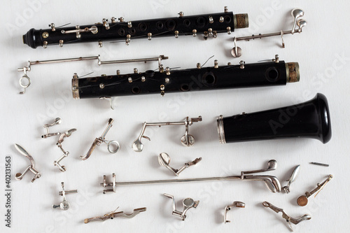 Old broken oboe. Repair of musical instruments.