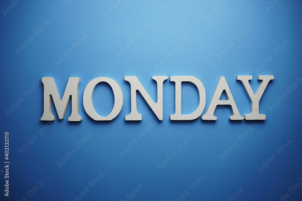 Monday alphabet letter on blue background Monday alphabet letter on blue background