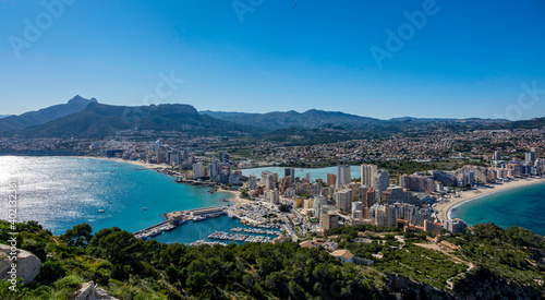 Beaches and mountains of Calpe. View from the natural park of Penyal d'Ifac, Spain photo