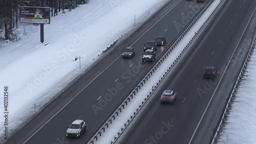 Dangerous driving. The driver cuts off a passing car. Aerial.