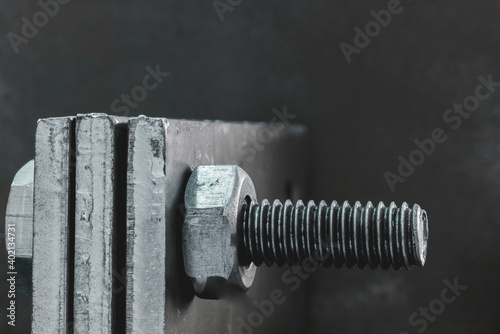 Closeup steel plate and bolt and nut
