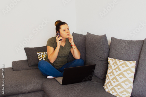 Girl at home working on the computer