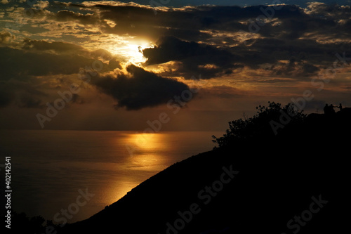 Fotografija The beautiful sunrise over the Sea of Galilee and the silhouette of Golan Height