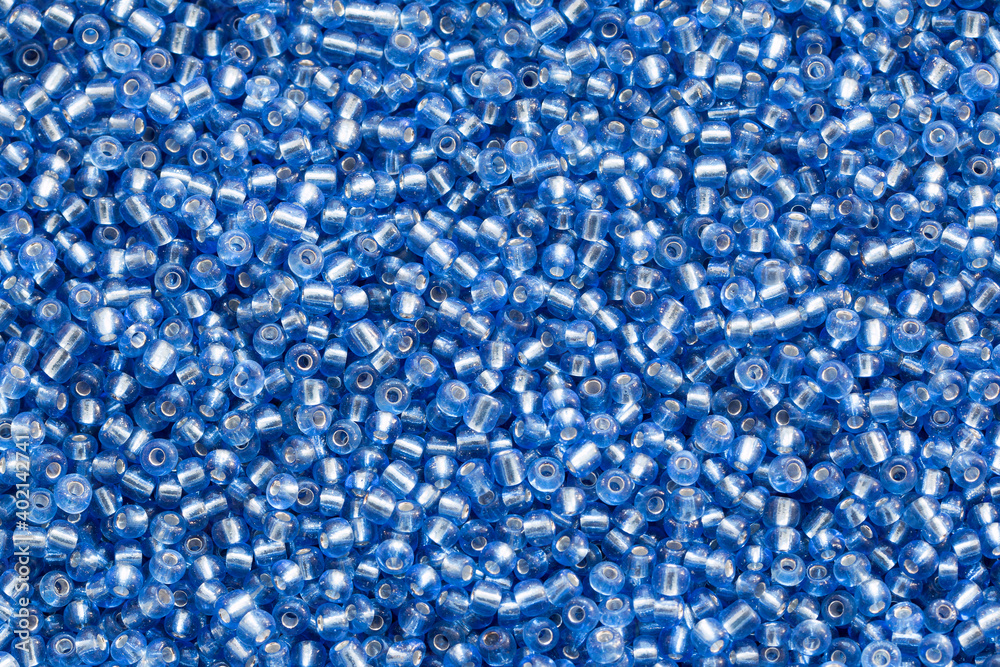 Background texture of blye beads closeup. Seamless beads texture. Hobbies, handmade jewelry, craft. Abstract background Background texture of blye beads closeup. Seamless beads texture. Hobbies, handmade jewelry, craft. Abstract background