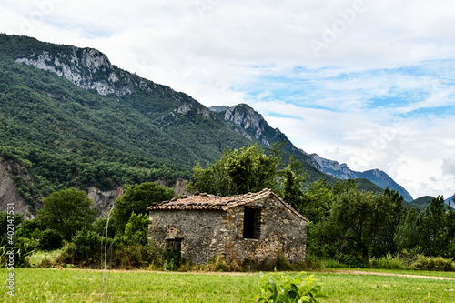 house in the mountains, photo as a background , in janovas fiscal sobrarbe , huesca aragon province photo