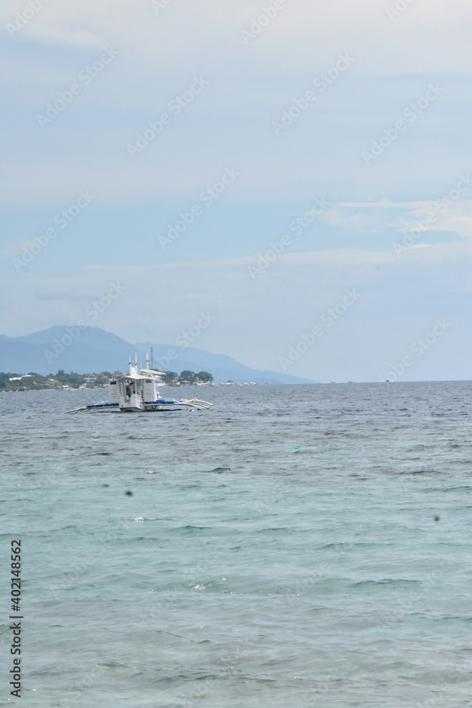 Obraz premium An Ocean Water Horizon And Boat