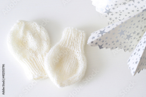 small white wool baby mittens