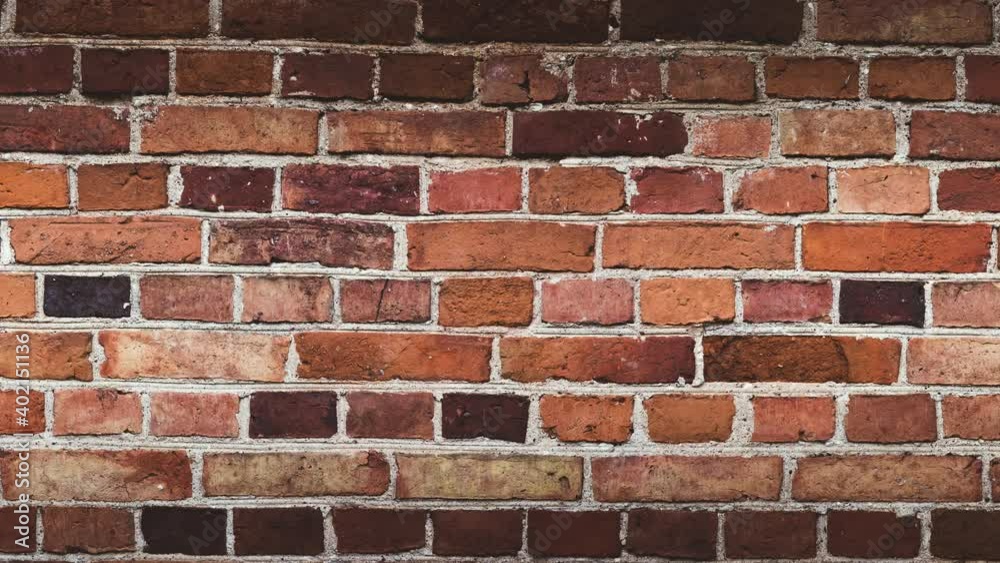 beautiful background of a red brick wall in motion of an old building in the loft style. 