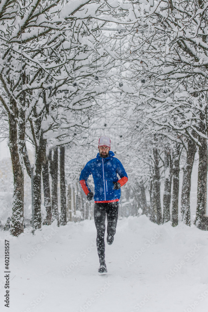 A young runner in a floor lined with snow