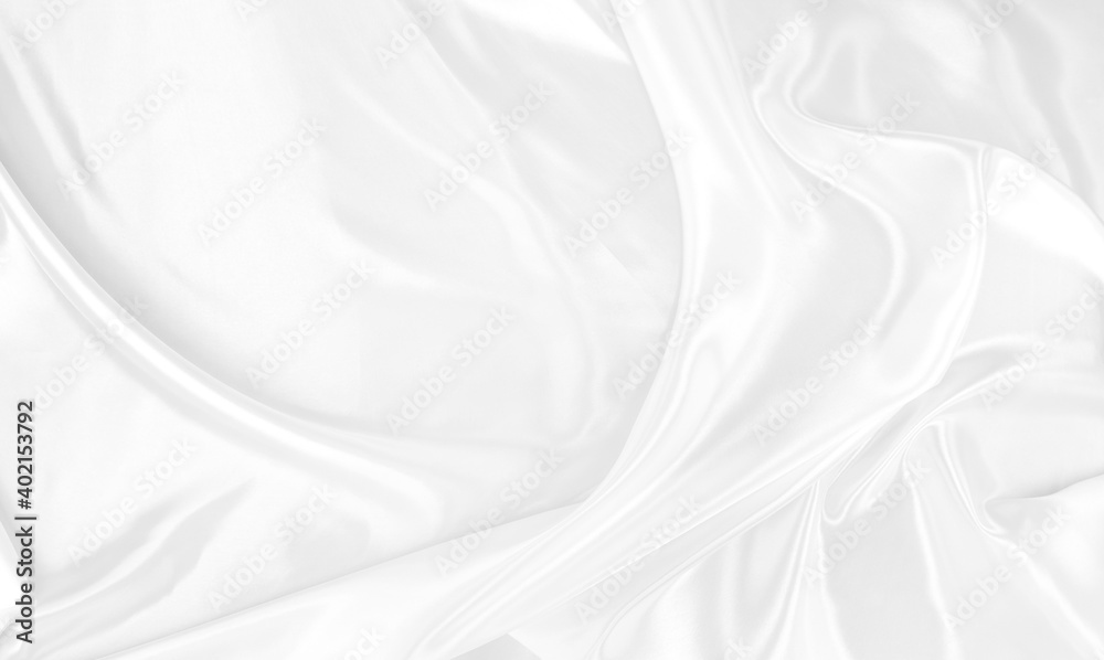 White gray satin texture that is white silver fabric silk background with beautiful soft blur pattern natural.