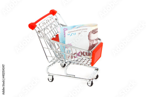 Shopping cart with one thousand hryvnias, isolated