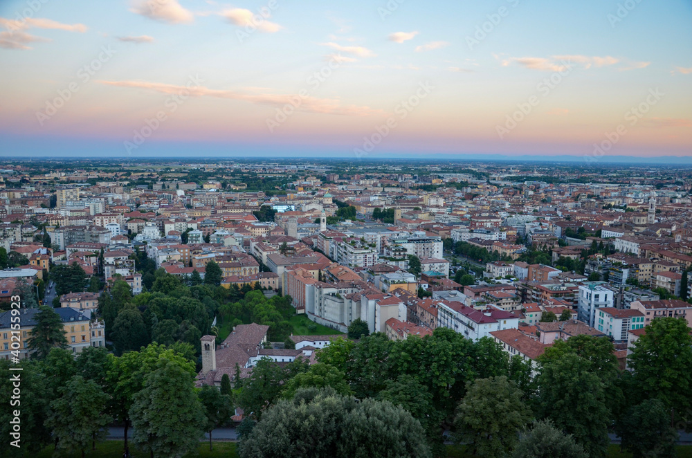 Bergamo in Lombardy in Italy at sunset, panoramic view from the cable railway station in the Upper town (Città Alta) towards the lower town (Città Bassa)