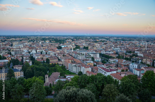 Bergamo in Lombardy in Italy at sunset, panoramic view from the cable railway station in the Upper town (Città Alta) towards the lower town (Città Bassa)