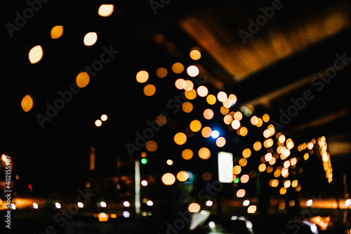 Yellow bokeh balls. Bokeh balls texture. Christmas and Happy new year on blurred bokeh with banner background.