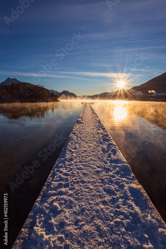 beautiful wooden jetty at a mountain lake, Salzkammergut, Austria