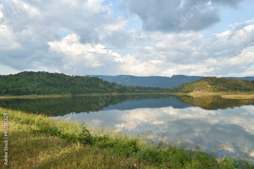 landscape of water reservoir lake with mountain background