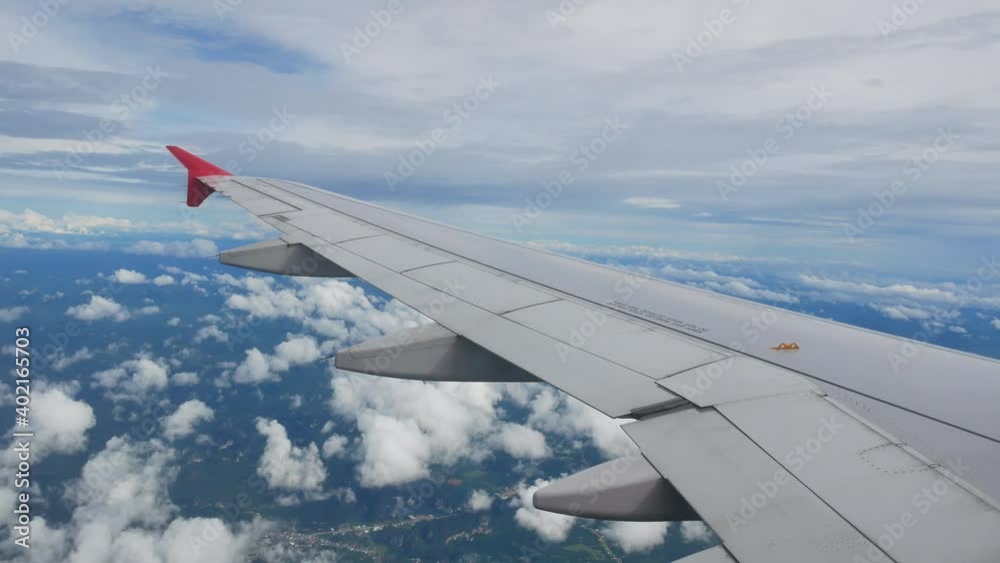 Sky from airplane with wing fly over cloud Sky from airplane with wing fly over cloud