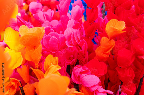 Colorful artificial flowers made out of colored sola, spongewood, handicrafts on display during the Handicraft Fair in Kolkata , West Bengal, India. It is the biggest handicrafts fair in Asia.