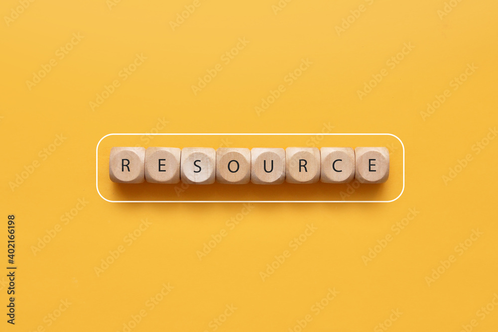 Wooden cubes in the form of a battery with the inscription: resource. Human resource status Wooden cubes in the form of a battery with the inscription: resource. Human resource status