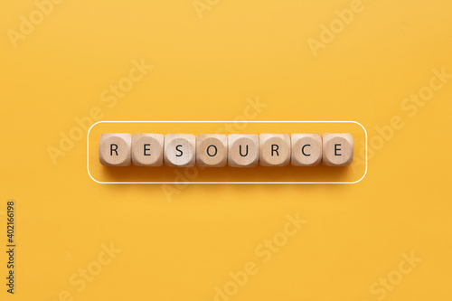 Wooden cubes in the form of a battery with the inscription: resource. Human resource status