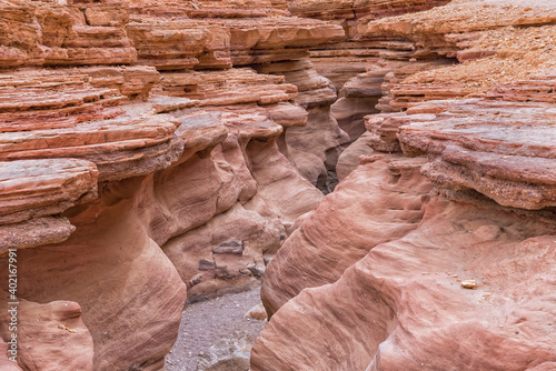 The Red Canyon in Israel. The wadi carves its way deep into red sandstone, creating a narrow and impressive canyon