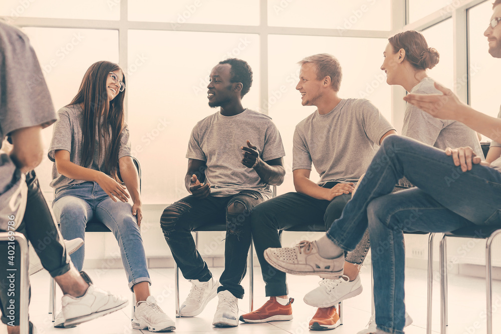 group of young like-minded people discussing their ideas