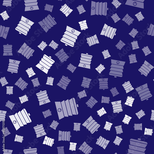 White Slow cooker icon isolated seamless pattern on blue background. Electric pan. Vector.