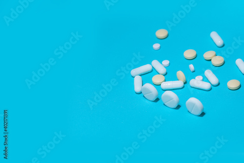close up. various tablets on a blue background.