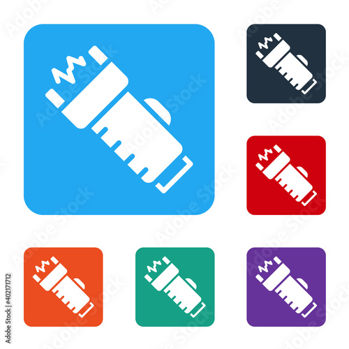 White Police electric shocker icon isolated on white background. Shocker for protection. Taser is an electric weapon. Set icons in color square buttons. Vector.