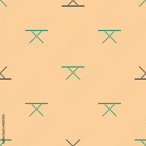 Green and black Ironing board icon isolated seamless pattern on beige background. Steam iron. Vector.