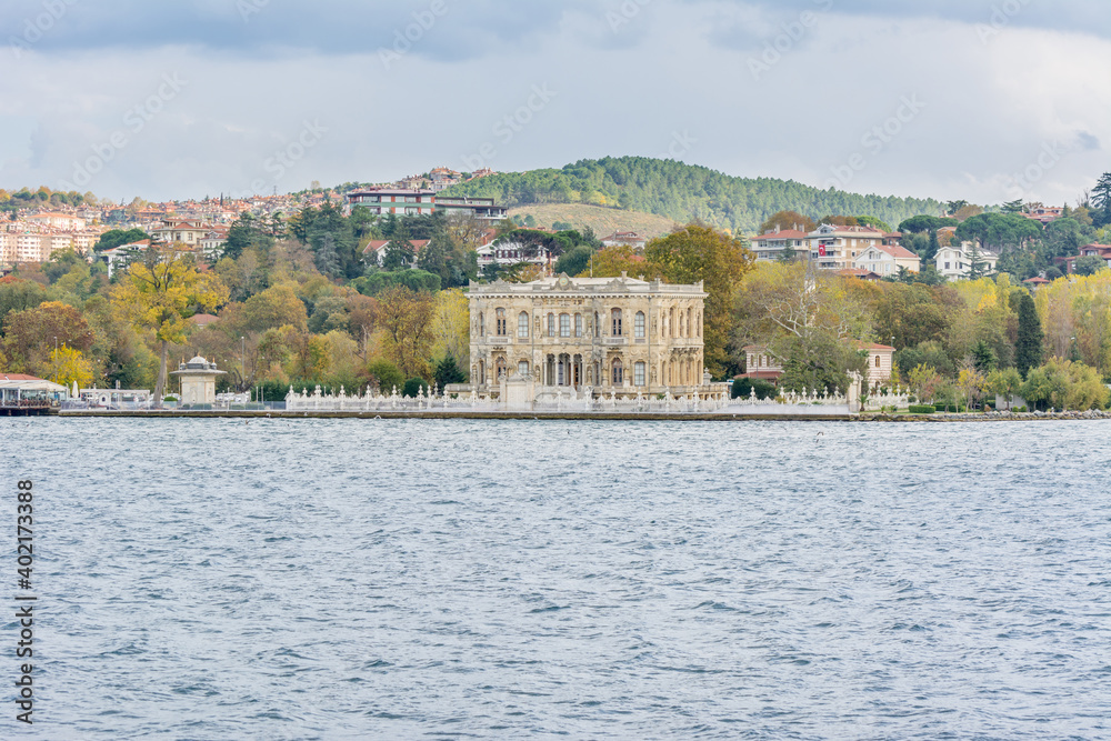 Goksu Palace (Littlewater Pavilion, Kucuksu Kasri) at the bank of the Bosphorus strait in Istanbul Turkey from ferry on a sunny day with background cloudy sky