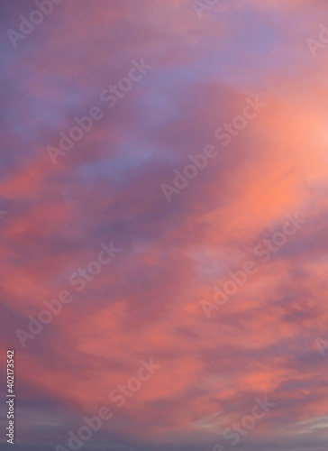 Deeply purple clouds on sunset background