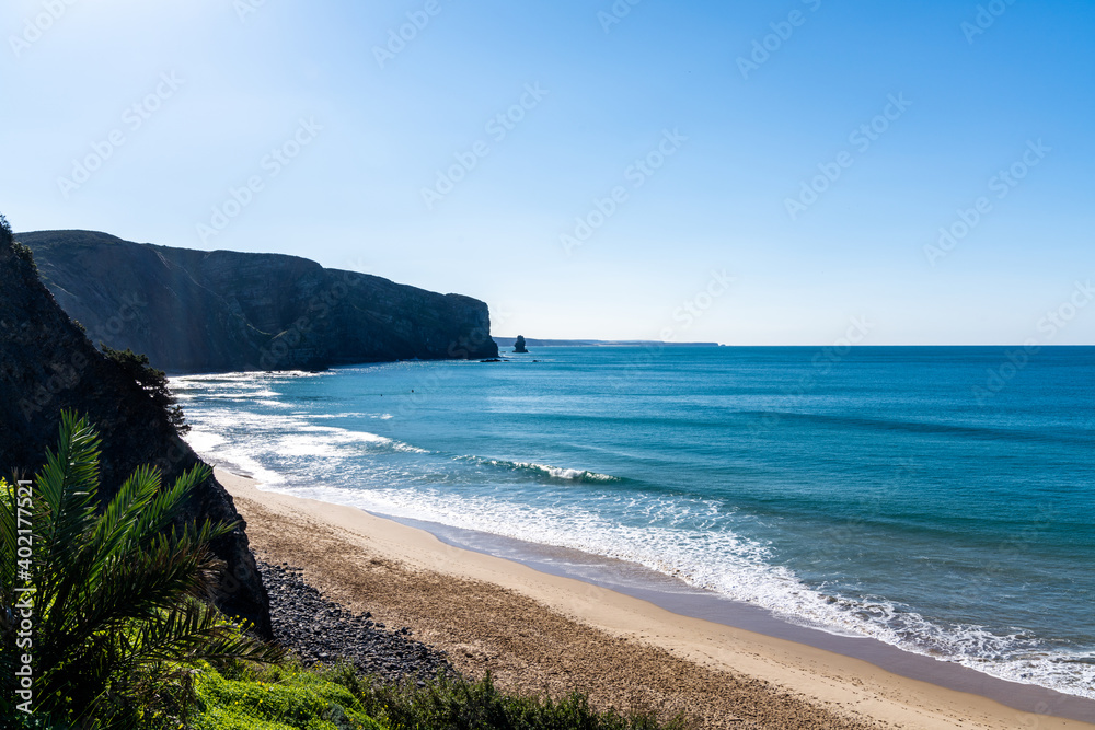 the bay at Arrifana with ist golden beach and steep cliffs the bay at Arrifana with ist golden beach and steep cliffs