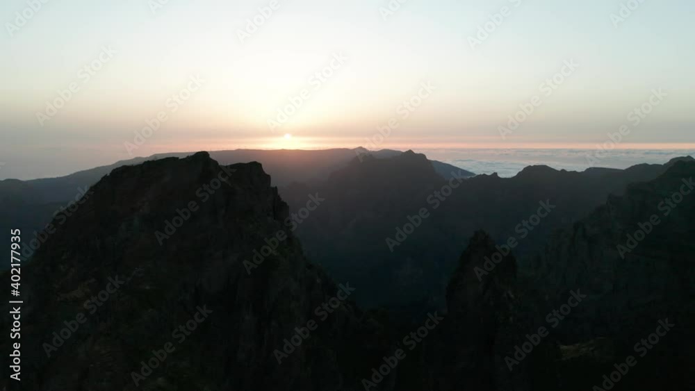 Truck left aerial of stunning mountains in Madeira during final hours of day Truck left aerial of stunning mountains in Madeira during final hours of day