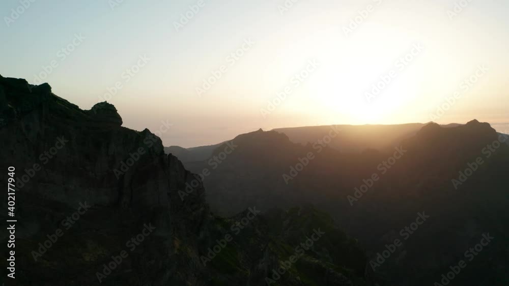 Incredible scenery of volcanic Madeira mountains during bright sundown Incredible scenery of volcanic Madeira mountains during bright sundown