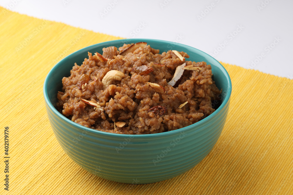 South Indian Sweet pongal made from rice, milk, jaggery and dry fruits.coconutsweet pongal South Indian Sweet pongal made from rice, milk, jaggery and dry fruits.coconutsweet pongal