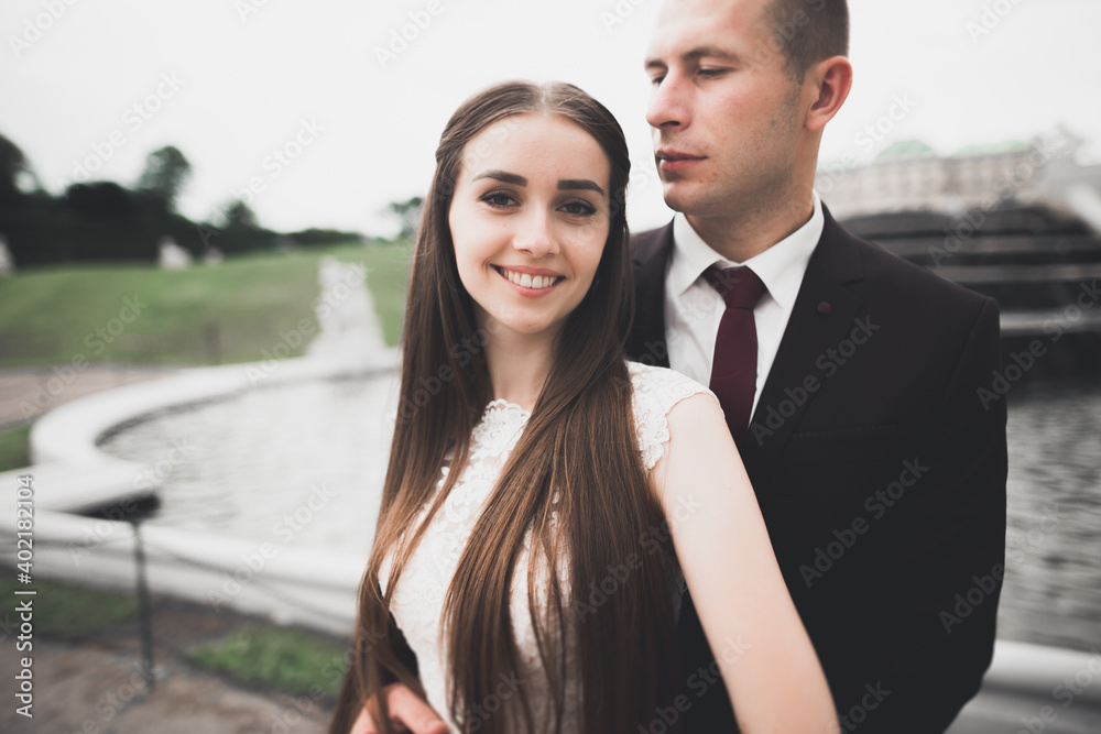 Sensual portrait of a young wedding couple. Outdoor Sensual portrait of a young wedding couple. Outdoor