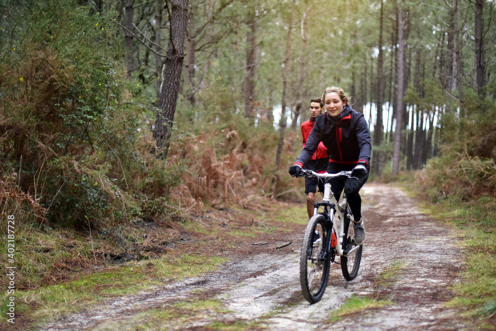 cute young couple doing sport in forest paths
cute young couple doing sport in forest paths