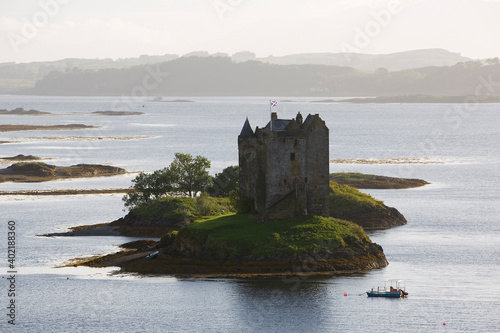 Stalker Castle, a four storey tower house or keep picturesquely set on a tidal islet on Loch Laich, Port Appin, Argyll, Scotland.