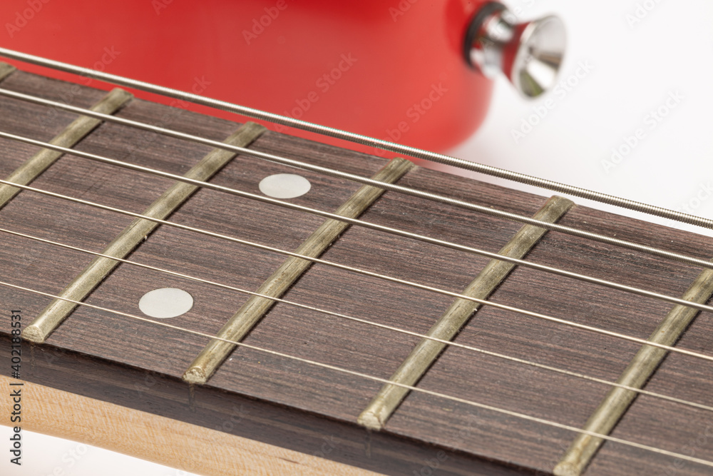Closeup of Guitar Frets and metal Strings Closeup of Guitar Frets and metal Strings
