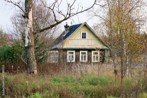 autumn view of old wooden house in the russian outback village © Sergei Timofeev