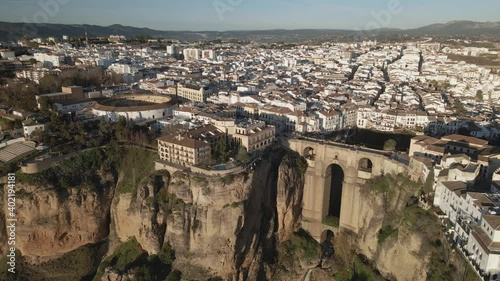 Aerial reveal of the town of Ronda, Spain, during sunset with a clean sky