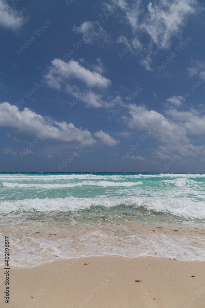 Beach and waves in cancun Mexico