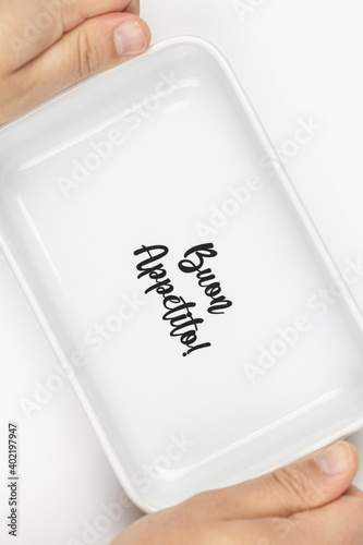 Baking tray with Buon Appetito sign above white background