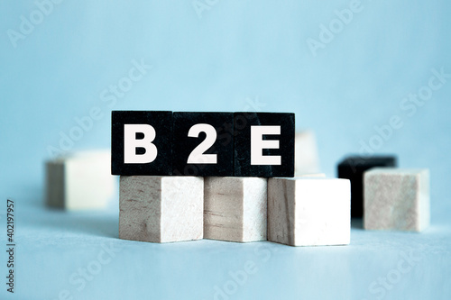 B2E. The text is on the dark and light cubes. Bright solution for business, financial, marketing concept photo